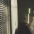 sunlight-coming-through-the-blinds-in-a-bedroom-VYJ6M6H.jpg